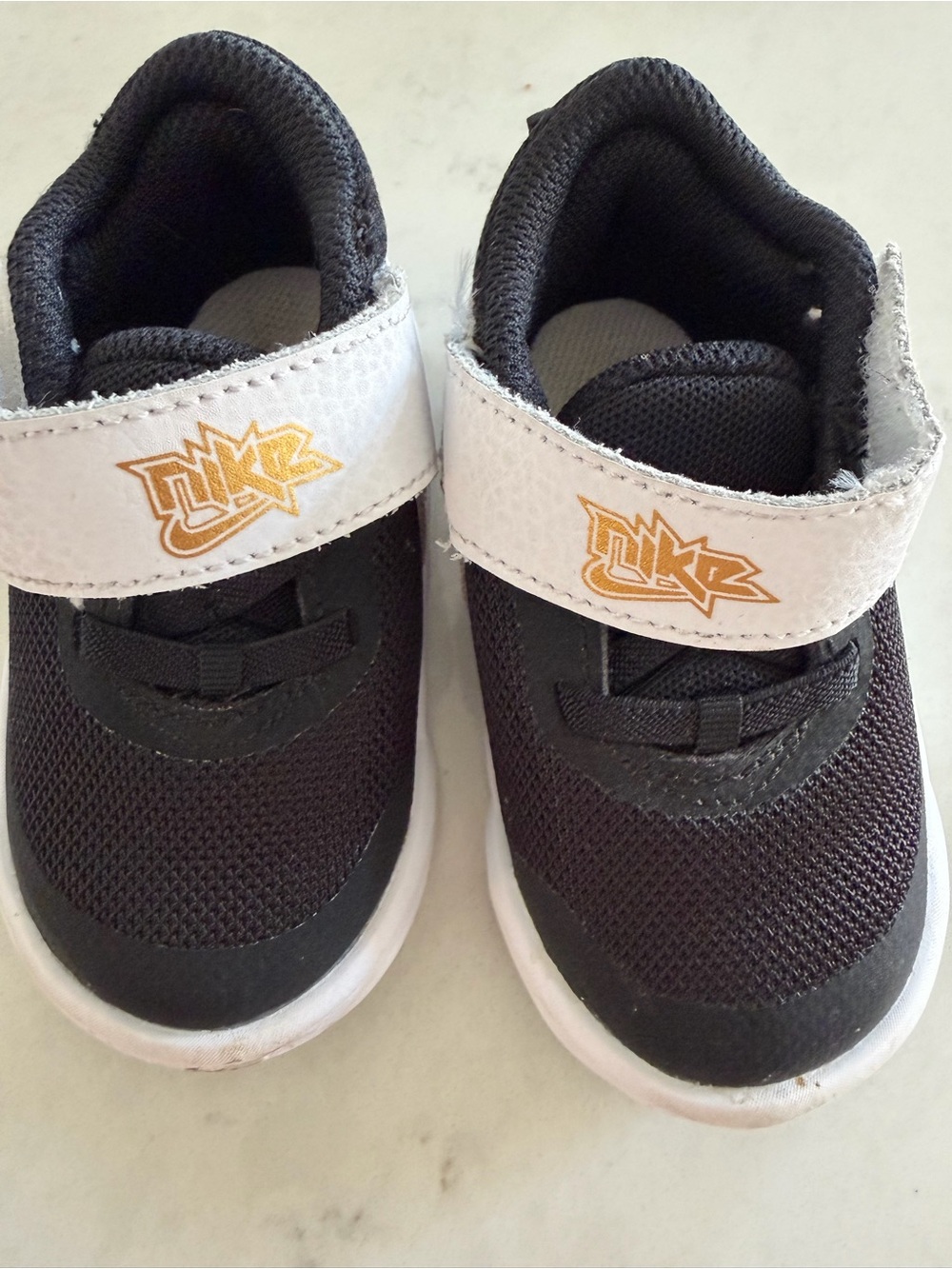 Nike Kids Black and White Mesh Velcro Sneakers with Gold Logo